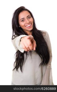 Young beautiful woman pointing at you, isolated over white