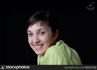 young beautiful woman portrait in black background