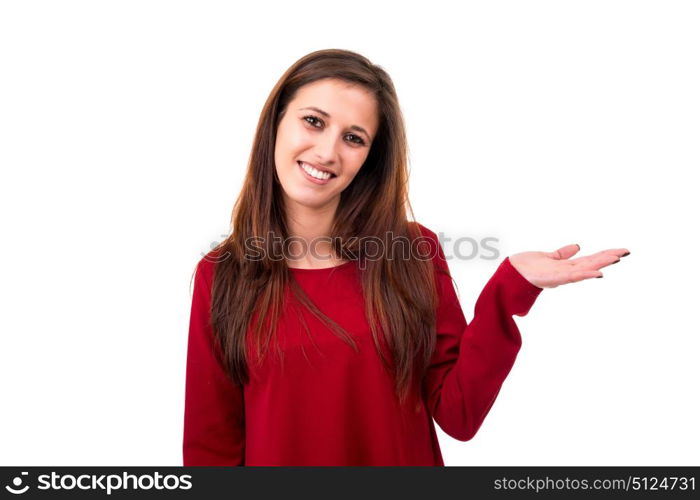 Young beautiful woman presenting your product, isolated over white background