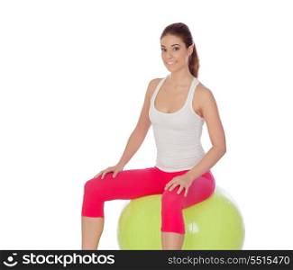 Young beautiful woman sit on a big ball isolated on white background