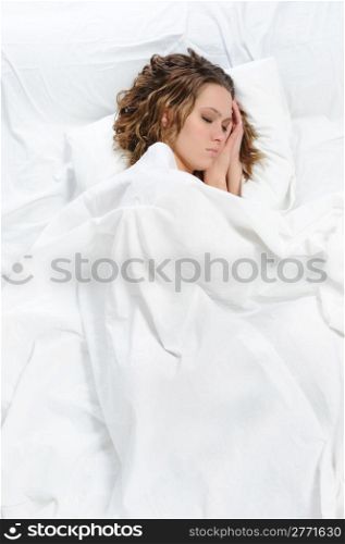 young beautiful woman sleeping on the bed