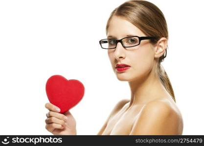 young beautiful woman with black glasses holding red heart. young beautiful woman with black glasses holding red heart on white background