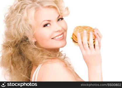 young beautiful woman with burger over white