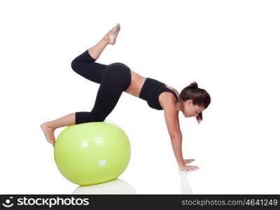 Young beautiful woman with gymnastic ball on a white background.