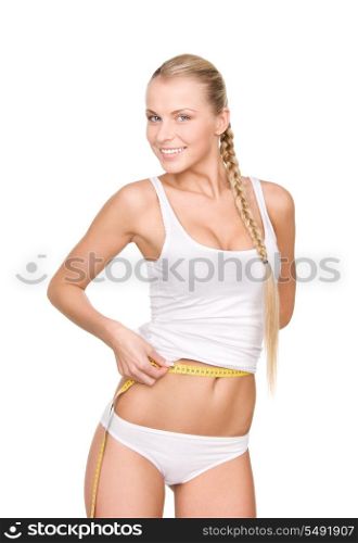 young beautiful woman with measure tape over white