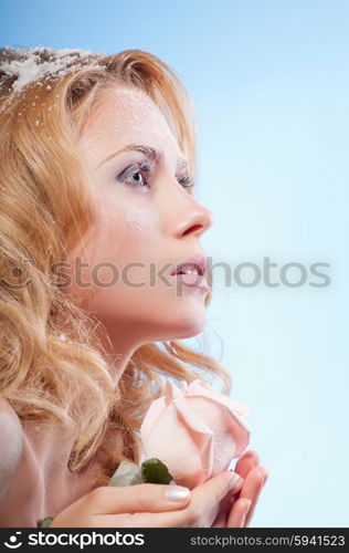 Young beautiful woman with snowy skin (warm colors)