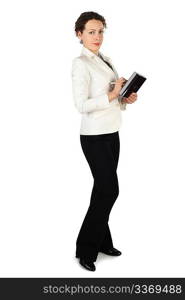 young beauty brunette woman in business dress, standing and holding notebook and pen, isolated on white