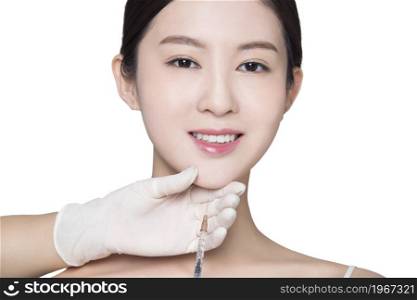 Young beauty having cosmetic surgery