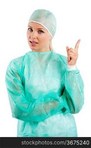 young beauty nurse in green operation dress acting to the camera