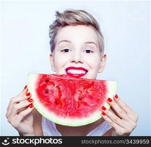 young beauty woman holding watermelon in her hand