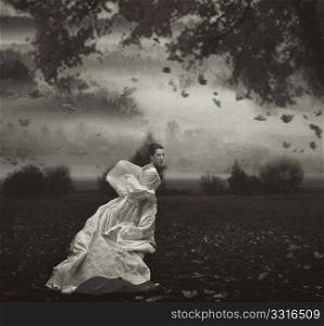 Young beauty woman over nature background in black and white