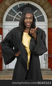 Young black african American woman in her graduation robes