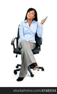 Young black businesswoman sitting and thinking in leather office chair