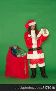 Young Black Santa Checking List