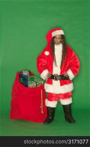 Young Black Santa With Bag of Toys