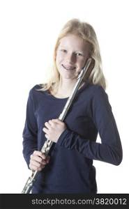 young blond girl holding flute in studio against white background