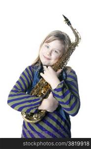 young blond girl holding saxophone in studio against white background