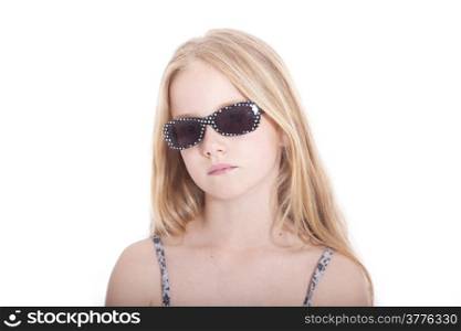 young blond girl with sunglasses in studio against white background
