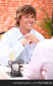Young blond in restaurant