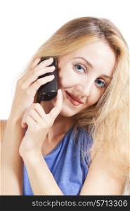 young blond woman talking by phone on white background