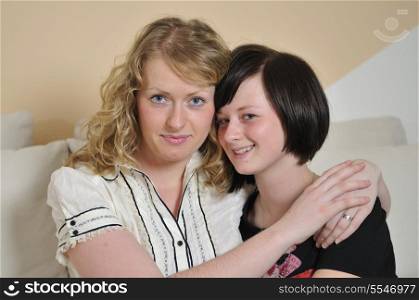 young blonde and brunette woman portrait