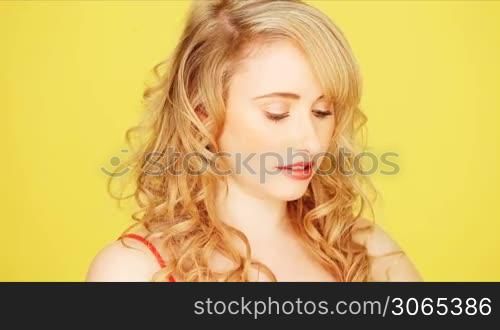 Young blonde girl on phone
