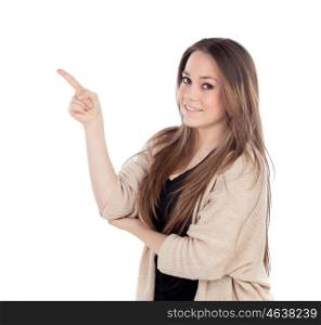 Young blonde girl pointing with the finger isolated on a white background
