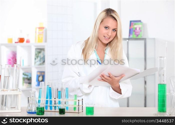 Young blonde in laboratory