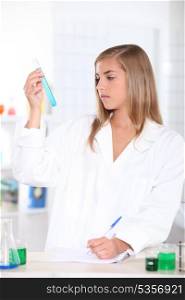 Young blonde in laboratory