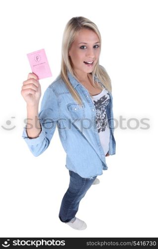 young blonde showing driving license
