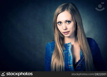 young blonde wearing jeans jacket torso shot