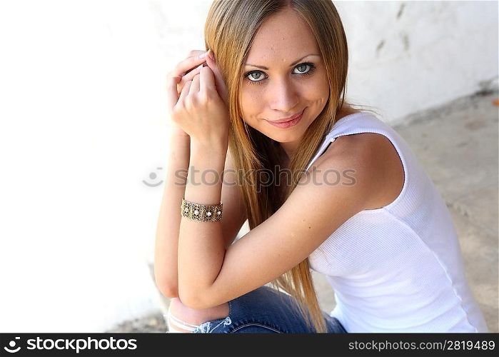 Young blonde woman making funny faces closeup