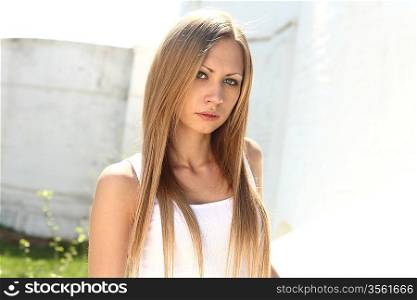 Young blonde woman - outdoors summer portrait