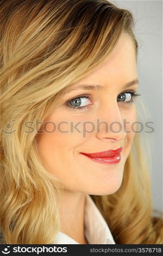 young blonde woman smiling