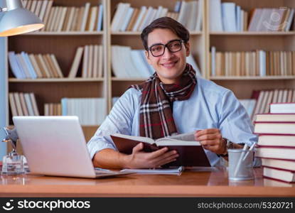 Young book writer writing in library