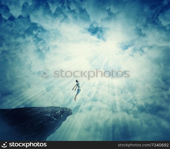 Young boy astral travel, mystical rapture state psychokinesis condition. Magic soul energy show human illusion. Mysterious place into the clouds