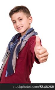 Young boy doing thumbs up over white