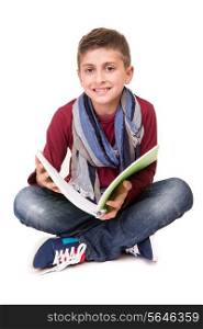 Young boy holding a sketchbook over white background