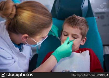 Young boy in a dental surgery teeth chech