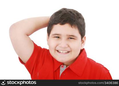 Young boy looking up with hand between the hair