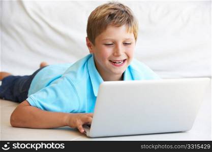 Young boy on his laptop computer