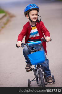 Young boy on the bicycle at Park