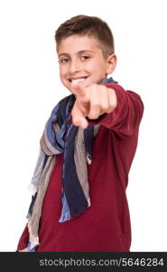 Young boy pointing front over white background