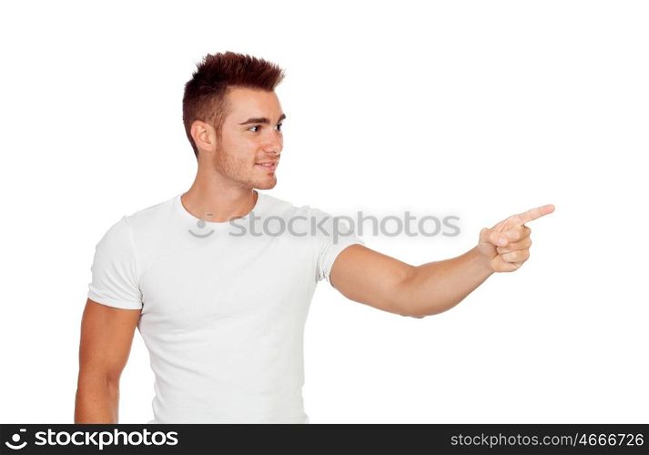 Young boy pointing something isolated on a white background
