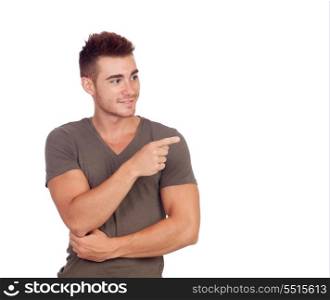 Young boy pointing something isolated on a white background