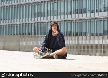 Young boy skateboarder at the local skatepark