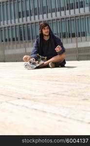 Young boy skateboarder at the local skatepark