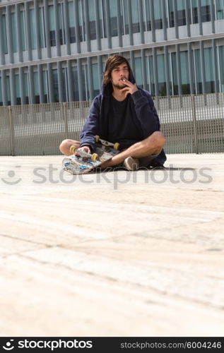 Young boy skateboarder at the local skatepark