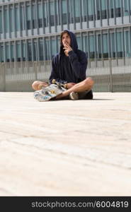 Young boy skateboarder at the local skatepark