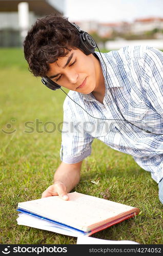 Young boy studying at the park